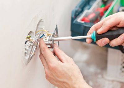 The hands of an electrician